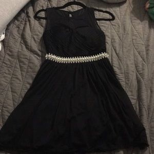 Medium length black dress